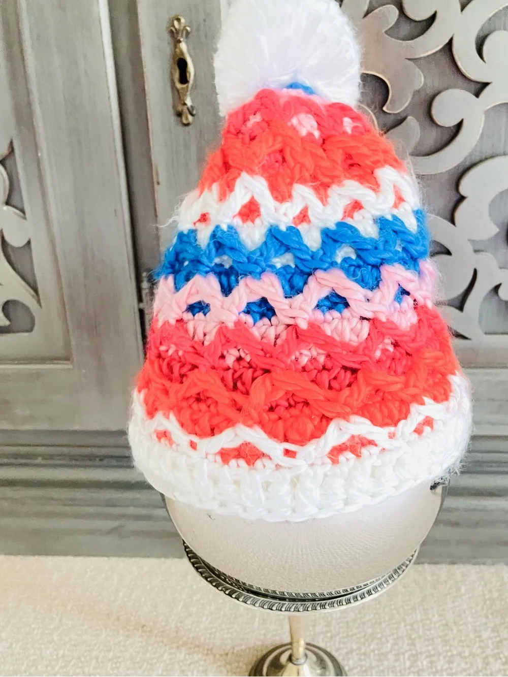 Obermeyer Teen  knit hat white blue red with pompom